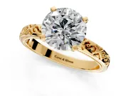 Solitaire Engagement Ring Setting for Round Cut Center with Scrollwork Band and Prong Head in Yellow Gold