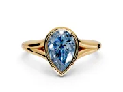 Solitaire Engagement Ring Setting for Fancy Blue Pear-Shaped Center with V Split Shank and Bezel Head in Yellow Gold