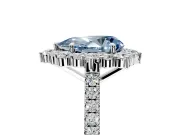Halo Engagement Ring Setting for Fancy Blue Pear-Shaped Center with Single-Row Pave, Open Basket and Prong Head in Platinum