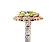 Halo Engagement Ring Setting for Fancy Yellow Pear-Shaped Center with Narrowing Pave Band and Prong Head in Rose Gold