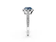 Bezel-Framed Halo Engagement Ring Setting for Fancy Blue Round Cut Center with Pave Band and Prong Head in Platinum