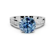 Solitaire Engagement Ring Setting for Fancy Blue Round Cut Center with Princess Cut Channel Band and Prong Head in Sterling Silver
