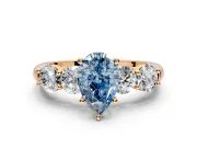 5 Stone Engagement Ring Setting for Fancy Blue Pear-Shaped Center with Graduated Accents and Prong Head in Rose Gold