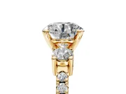 3 Stone Engagement Ring Setting for Round Cut Center with Round Cut Side Accents and Prong Head in Yellow Gold