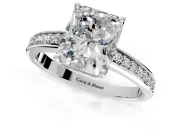 Solitaire Engagement Ring Setting for Radiant Cut Center with Channel-Set Accent Band and Prong Head in Platinum
