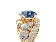 Halo Engagement Ring Setting for Fancy Blue Round Cut Center with Marquise and Pave Bypass Band and Prong Head in Yellow Gold