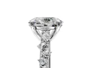 Solitaire Engagement Ring Setting for Oval Center with Trailing Leaf Accent Band and Prong Head in White Gold