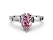 3 Stone Engagement Ring Setting for Fancy Pink Pear-Shaped Center with Channel Baguette Accents and Prong Head in Platinum