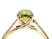 Solitaire Engagement Ring Setting for Fancy Yellow Emerald Cut Center with Cathedral Channel Band and Prong Head in Yellow Gold