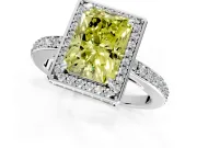 Halo Engagement Ring Setting for Fancy Yellow Radiant Cut Center with Metal-Rimmed Halo, Pave Band and Prong Head in Platinum
