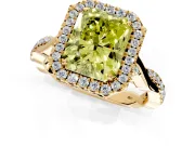 Halo Engagement Ring Setting for Fancy Yellow Radiant Cut Center with Twist Band and Prong Head in Yellow Gold