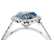 Halo Engagement Ring Setting for Fancy Blue Heart-Shaped Center with Narrowing Pave Band and Prong Head in White Gold