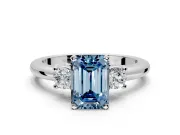 3 Stone Engagement Ring Setting for Fancy Blue Emerald Cut Center with Wide Plain Band and Prong Head in White Gold