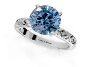Solitaire Engagement Ring Setting for Fancy Blue Round Cut Center with Milgrain X Pattern Band and Prong Head in White Gold