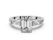 3 Stone Engagement Ring Setting for Emerald Cut Center with Tapered Baguettes, Plain Band and Prong Head in Platinum