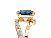 Solitaire Engagement Ring Setting for Fancy Blue Emerald Cut Center with Pave Bypass Swirl Band and Prong Head in Yellow Gold