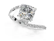 Solitaire Engagement Ring Setting for Cushion Cut Center with Pave Bypass Swirl Band and Prong Head in Platinum