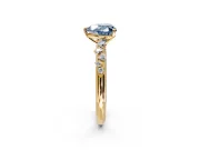 Cluster Engagement Ring Setting for Fancy Blue Heart-Shaped Center with Round Cut Accent Band and Prong Head in Yellow Gold