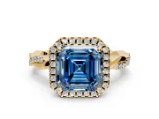 Halo Engagement Ring Setting for Fancy Blue Asscher Cut Center with Pave and Plain Twist Band and Prong Head in Yellow Gold