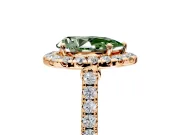 Halo Engagement Ring Setting for Fancy Green Pear-Shaped Center with Narrowing Pave Band and Prong Head in Rose Gold