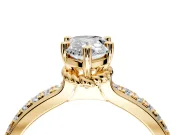 Solitaire Engagement Ring Setting for Pear-Shaped Center with Raised Channel Band and Prong Head in Yellow Gold