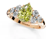 Cluster Engagement Ring Setting for Fancy Yellow Pear-Shaped Center with Round Cut Accent Frame and Prong Head in Rose Gold