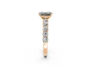 Shared-Prong Engagement Ring Setting for Emerald Cut Center with Graduated Accents and Prong Head in Rose Gold