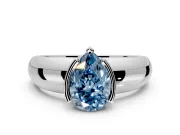Tension Engagement Ring Setting for Fancy Blue Pear-Shaped Center with Wide Flat Band and Tension Head in Platinum