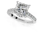 Solitaire Engagement Ring Setting for Princess Cut Center with Crossover Accents and Prong Head in Platinum
