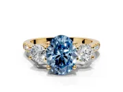 3 Stone Engagement Ring Setting for Fancy Blue Oval Center with Crossover Basket, Pave Band and Prong Head in Yellow Gold