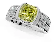 Bezel Engagement Ring Setting for Fancy Yellow Cushion Cut Center with Wide Channel-Set Band and Bezel Head in Platinum
