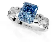 Leaf Engagement Ring Setting for Fancy Blue Radiant Cut Center with Milgrain Accent Band and Prong Head in Platinum