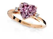 3 Stone Engagement Ring Setting for Fancy Pink Heart-Shaped Center with Low-Set Round Cut Accents and Prong Head in Rose Gold