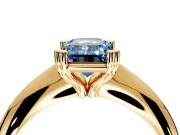 Solitaire Engagement Ring Setting for Fancy Blue Emerald Cut Center with Reverse Tapered Band and Prong Head in Yellow Gold