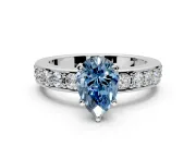 Solitaire Engagement Ring Setting for Fancy Blue Pear-Shaped Center with Channel-Set Accents and Prong Head in White Gold