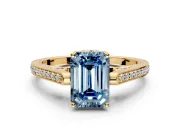 Cathedral Engagement Ring Setting for Fancy Blue Emerald Cut Center with Antique-Style Pave Band and Prong Head in Yellow Gold