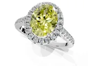 Halo Engagement Ring Setting for Fancy Yellow Oval Center with Narrowing Pave Band and Prong Head in White Gold