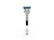 Solitaire Engagement Ring Setting for Fancy Blue Emerald Cut Center with Crossover Accents and Prong Head in Platinum