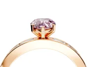 Solitaire Engagement Ring Setting for Fancy Pink Pear-Shaped Center with Channel Baguette Band and Prong Head in Rose Gold