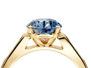 Solitaire Engagement Ring Setting for Fancy Blue Round Cut Center with Channel Accents and Prong Head in Yellow Gold