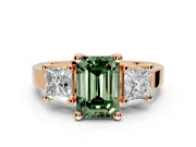 3 Stone Engagement Ring Setting for Fancy Green Emerald Cut Center with Matching Side Accents and Prong Head in Rose Gold