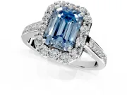 Floral Halo Engagement Ring Setting for Fancy Blue Emerald Cut Center with Large Halo Accents and Prong Head in Platinum