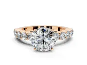 Shared-Prong Engagement Ring Setting for Round Cut Center with Graduated Accents and Prong Head in Rose Gold