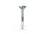 Cluster Engagement Ring Setting for Fancy Blue Oval Center with Round Cut Accent Band and Prong Head in Sterling Silver