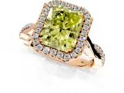 Halo Engagement Ring Setting for Fancy Yellow Radiant Cut Center with Twist Band and Prong Head in Rose Gold