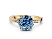 Side Accent Engagement Ring Setting for Fancy Blue Round Cut Center with Accent Shoulders and Prong Head in Yellow Gold