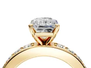 Solitaire Engagement Ring Setting for Radiant Cut Center with Channel-Set Accents and Prong Head in Yellow Gold