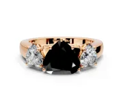 3 Stone Engagement Ring Setting for Fancy Black Heart-Shaped Center with Raised Basket Heads and Prong Head in Rose Gold