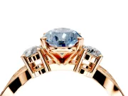3 Stone Engagement Ring Setting for Fancy Blue Pear-Shaped Center with Pave Twist Band and Prong Head in Rose Gold