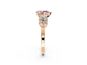 Cluster Engagement Ring Setting for Fancy Pink Pear-Shaped Center with 2-Row Shoulder Clusters and Prong Head in Rose Gold